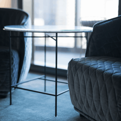 executive coaching goal Minimalist table and two gray seats