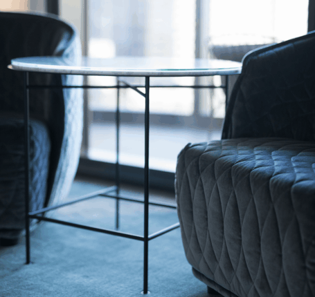 executive coaching goal Minimalist table and two gray seats