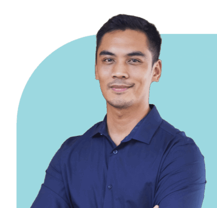 Person 11 Pria profesional Indonesia dengan emotional intelligence tinggi tersenyum percaya diri memakai kemeja biru tua di latar teal