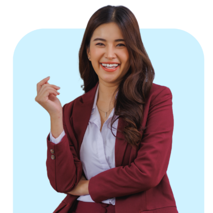 person 13 Integrated Development Program terpadu di Indonesia - wanita profesional muda berblazer merah tersenyum percaya diri siap berkembang melalui pengembangan karir dan kompetensi holistik